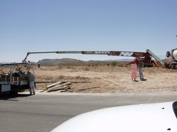 Long long boom puts concrete where it is needed